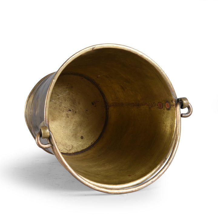 Interior Of Antique Brass Puja Campaign Bucket With Riveted Handle