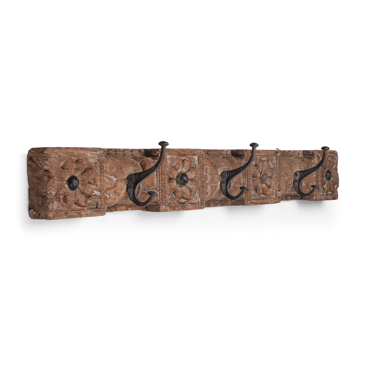 Angled View Of 19th Century Indian Carved Teak Panel Coat Rack With Floral Carving And Iron Hooks