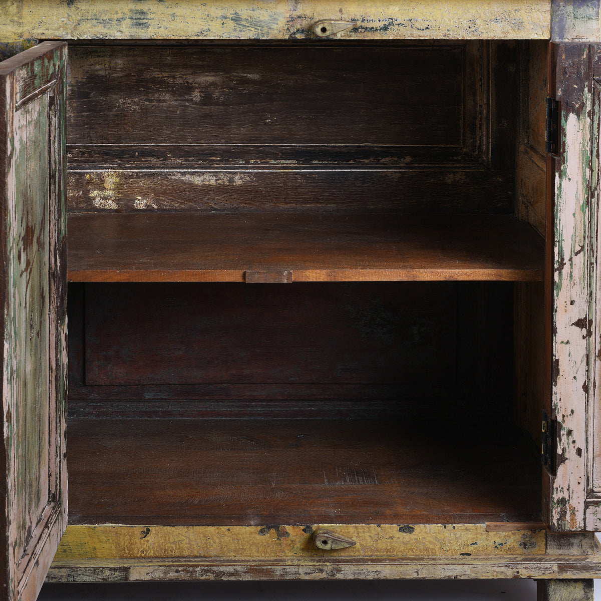 Interior Detail From Vividly Painted Sideboard With Four Doors And Shelf Made From Reclaimed Wood From Historic Buildings In Rajasthan And Gujarat