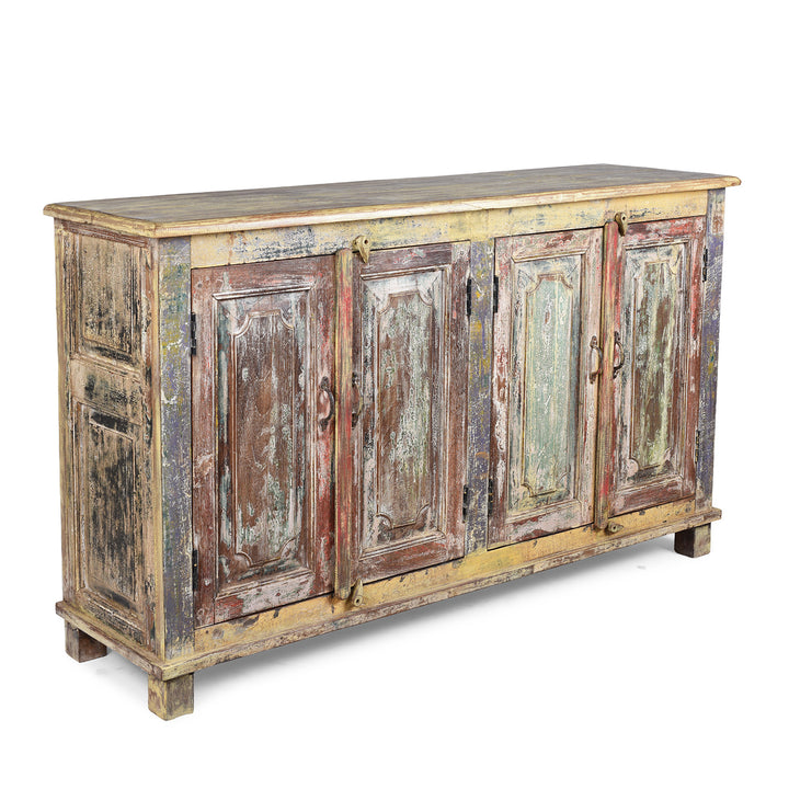 Angled VIew Of Vividly Painted Sideboard With Four Doors And Shelf Made From Reclaimed Wood From Historic Buildings In Rajasthan And Gujarat