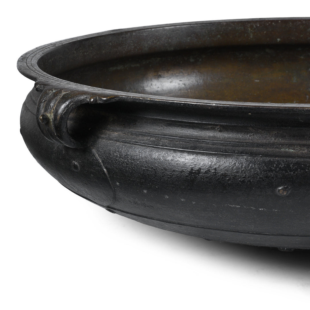 Detailed View Of Bronze Urli Cauldron From Kerala South India Late 19th Century With Loop Handles And Aged Patina