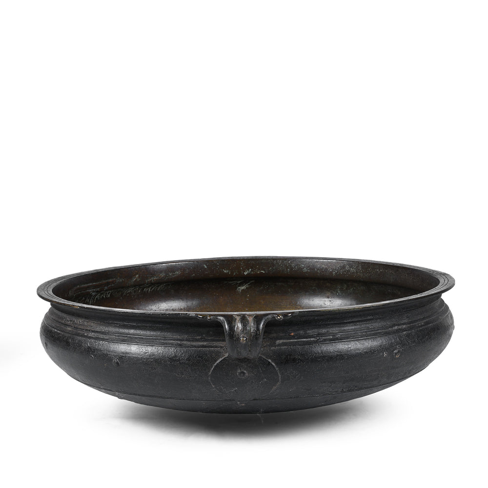 Side View Of Bronze Urli Cauldron From Kerala South India Late 19th Century With Loop Handles And Aged Patina
