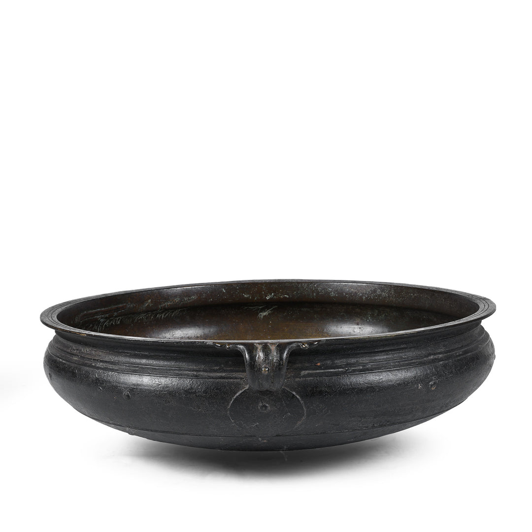 Side View Of Bronze Urli Cauldron From Kerala South India Late 19th Century With Loop Handles And Aged Patina