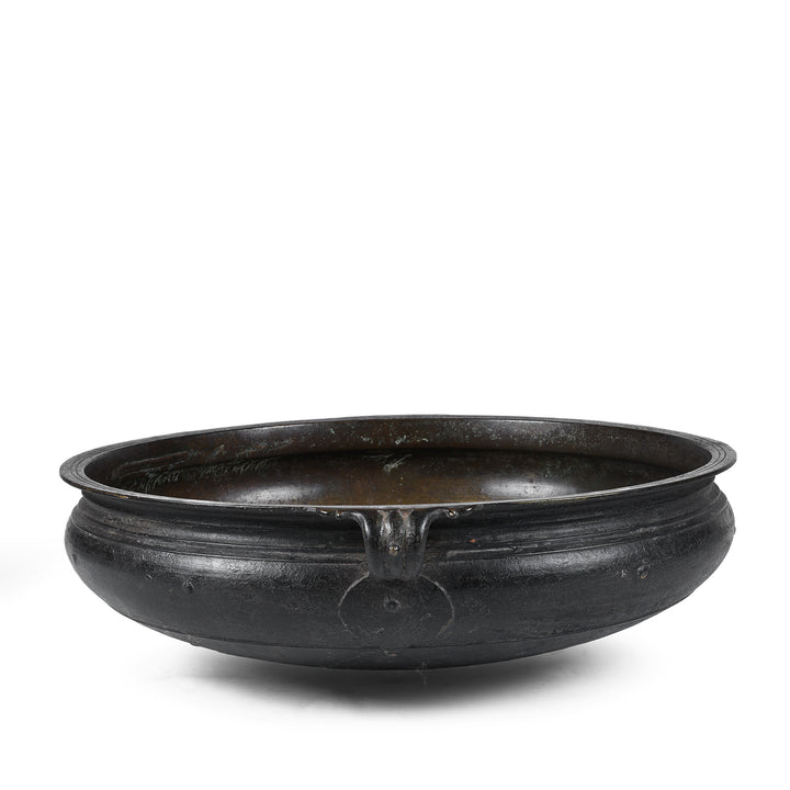 Side View Of Bronze Urli Cauldron From Kerala South India Late 19th Century With Loop Handles And Aged Patina