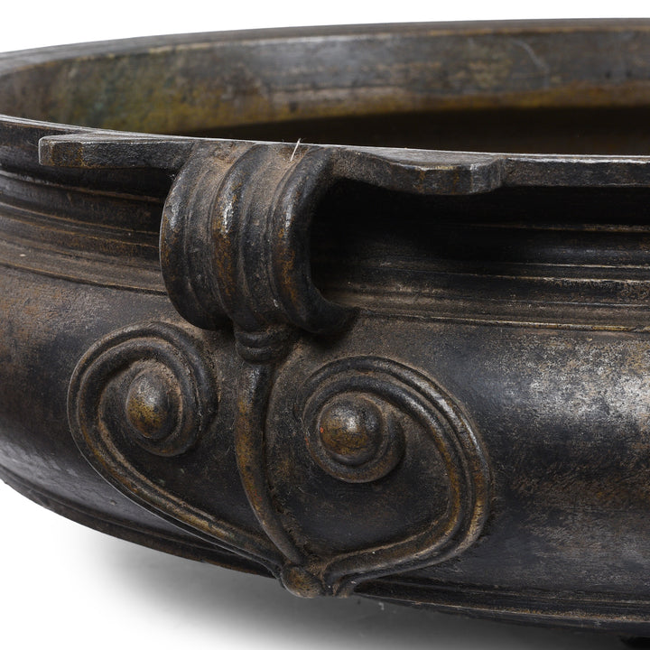 Stylised yoni on antique bronze urli from South India