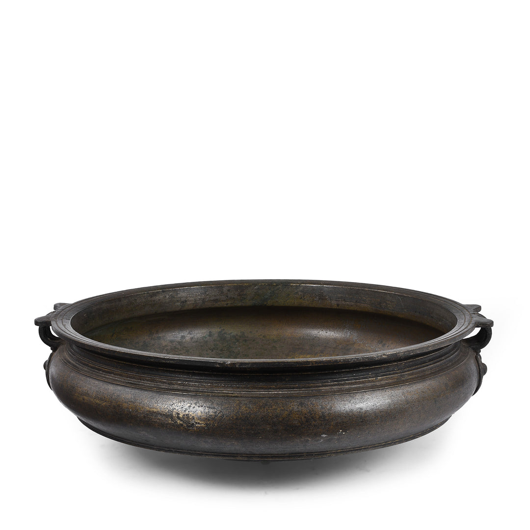 back of antique bronze urli