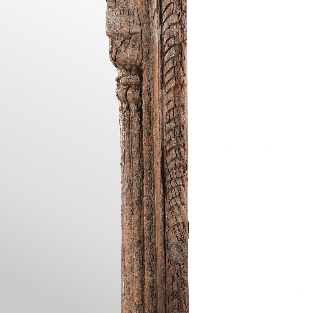 Side Detail Of Wood Carving From  Antique Indian Teak Window Mirror With Arched Frame And Intricate Lattice Carving At The Top