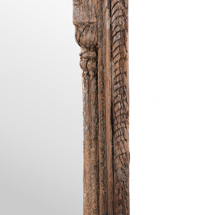 Side Detail Of Wood Carving From  Antique Indian Teak Window Mirror With Arched Frame And Intricate Lattice Carving At The Top