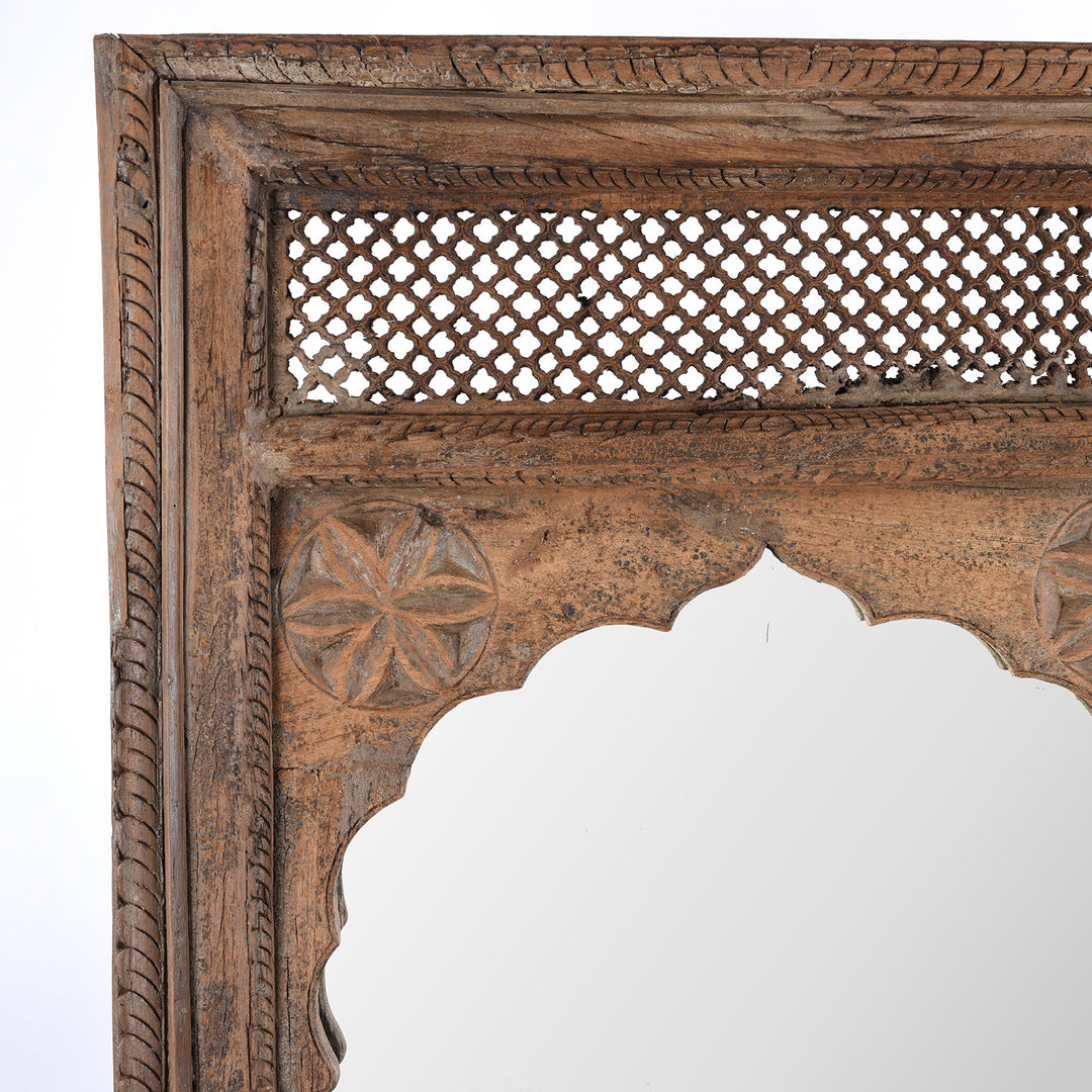 Detail Of Jali Carvings From  Antique Indian Teak Window Mirror With Arched Frame And Intricate Lattice Carving At The Top