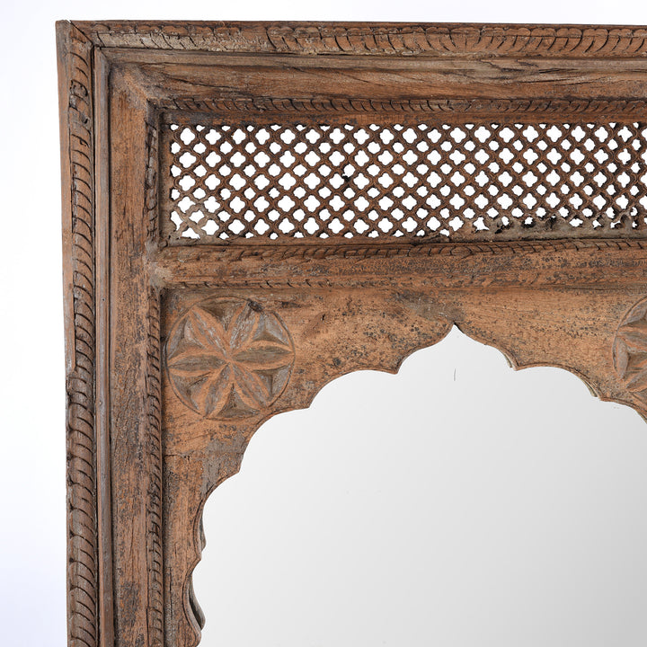 Detail Of Jali Carvings From  Antique Indian Teak Window Mirror With Arched Frame And Intricate Lattice Carving At The Top