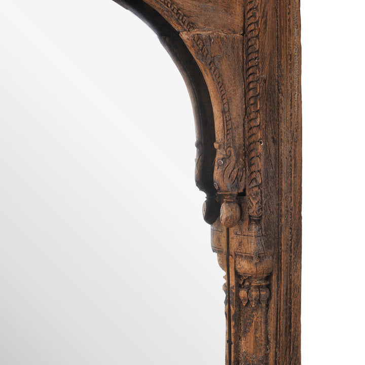 Arch Carving Depth Detail From Antique Indian Mirror Made From A 19th-Century Hand-Carved Teak Window Frame With Mughal Arch And Jali Panel From Madhya Pradesh.