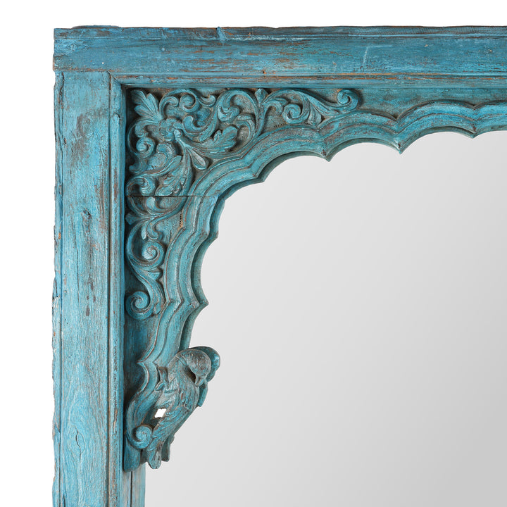 Corner Detail Showing Frame, Floral Carvings And Parrot Detail From Antique Teak Mirror With Blue Patina And Carved Parrot Motifs From Northern India.