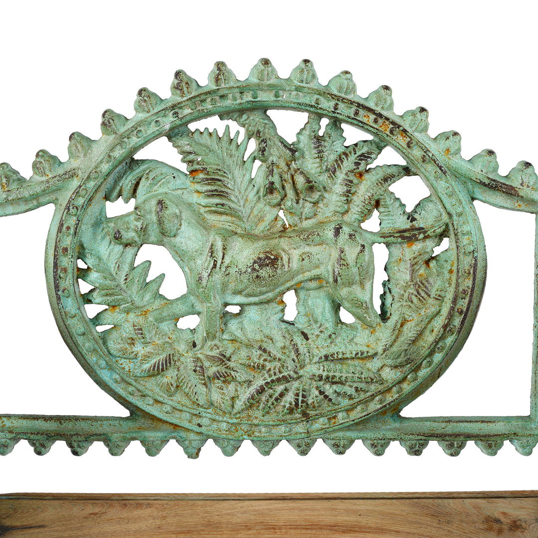 Dog Design Detail From Reproduction cast iron garden seat with dog motif €“ heavy€‘duty vintage-style outdoor seat featuring detailed dog-shaped design and slatted timber seat