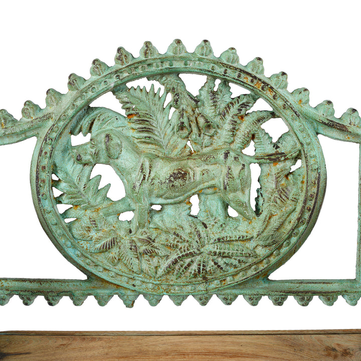 Dog Design Detail From Reproduction cast iron garden seat with dog motif €“ heavy€‘duty vintage-style outdoor seat featuring detailed dog-shaped design and slatted timber seat