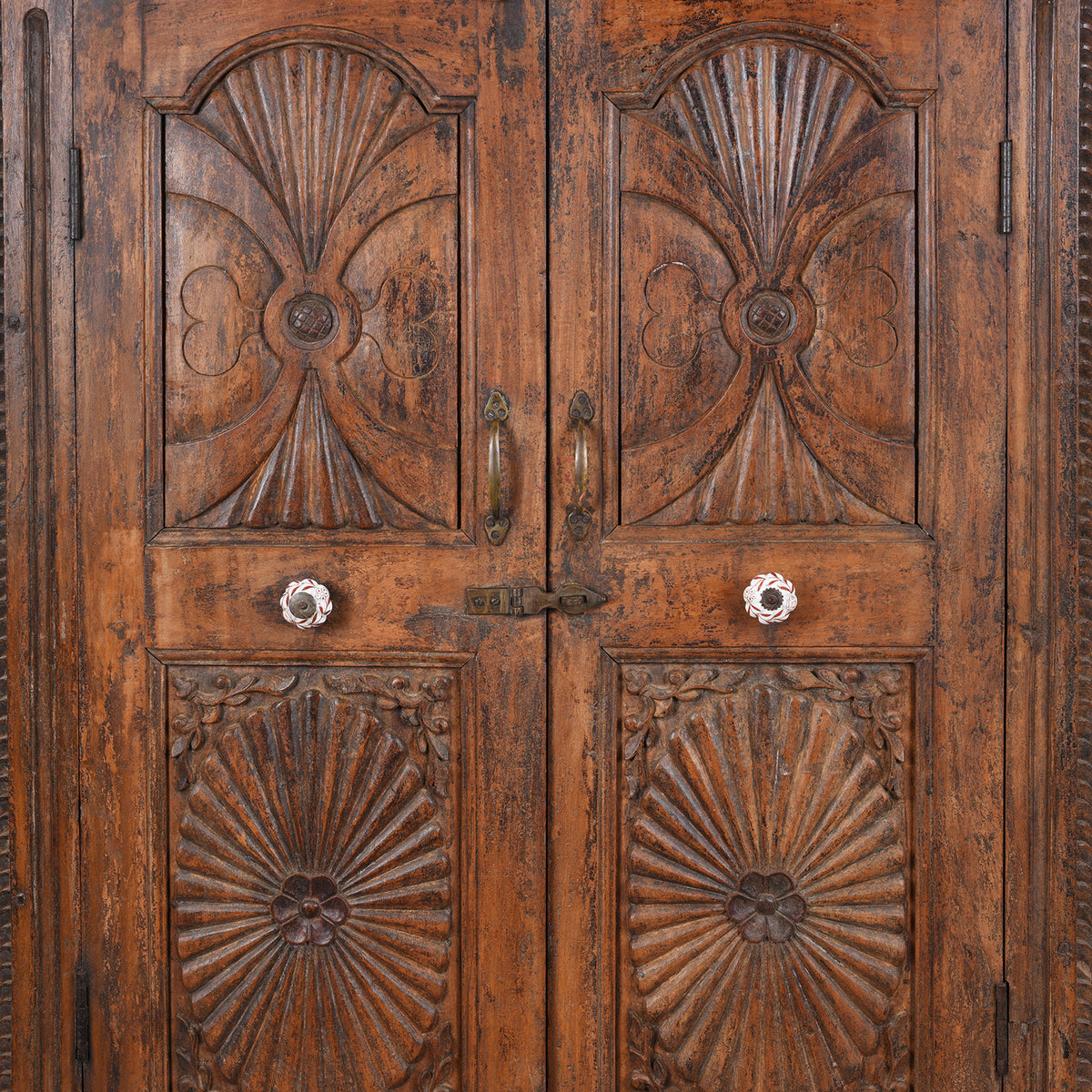 Central Carved Door Panel Detail From 19th Century Teak Almirah Cabinet from Gujarat €“ Hand-Carved Panels with Sunburst Motifs and Original Peranakan Ceramic Tiles