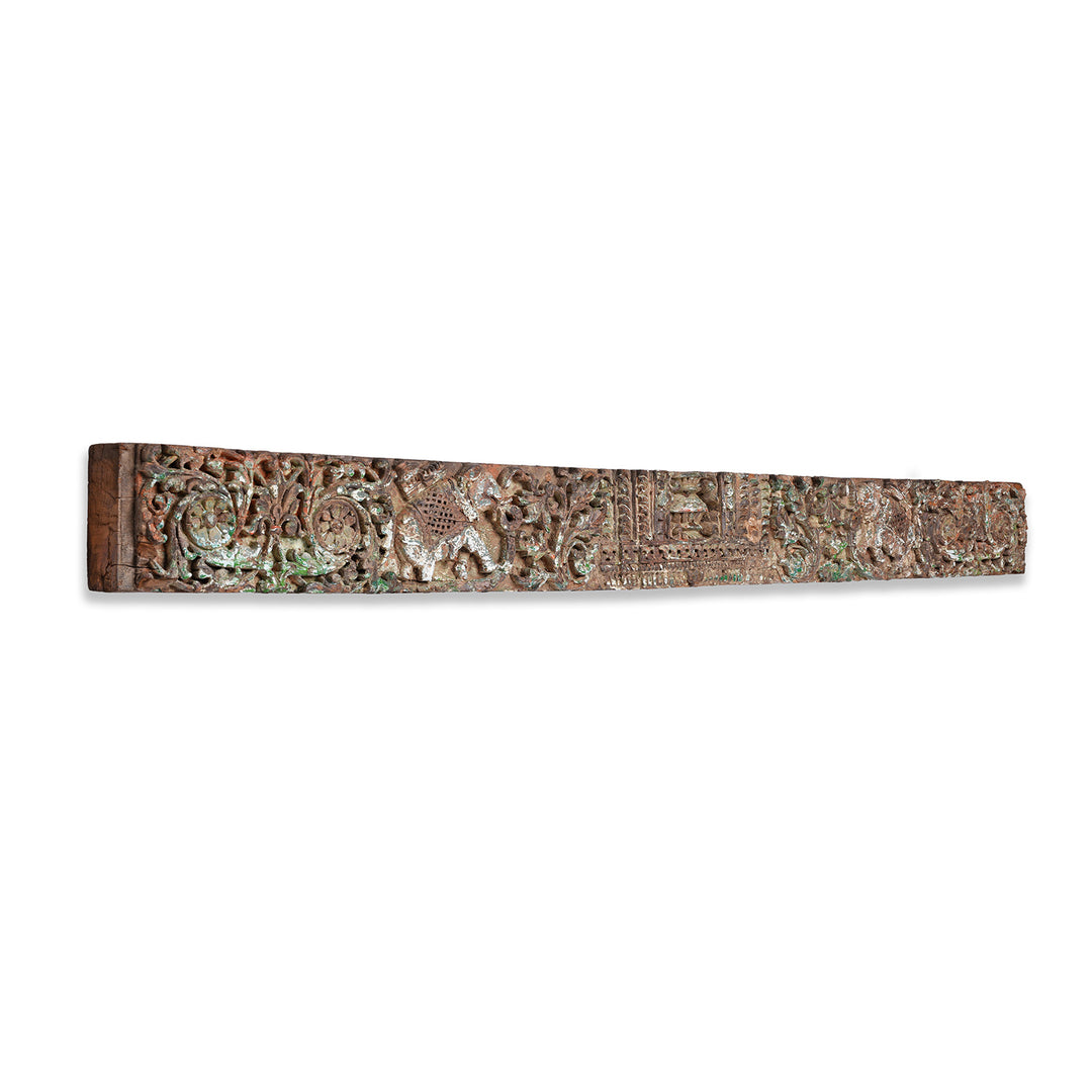 Angled VIew Of Carved Nineteenth Century Teak Lintel From Gujarat Featuring Elephants And Intricate Floral Detailing