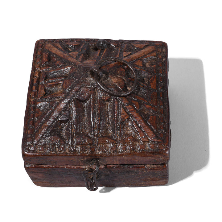 Top Down VIew Of Carved Teak Tika Box From Banswara With Tribal Geometric Lid And Red Pigment Interior