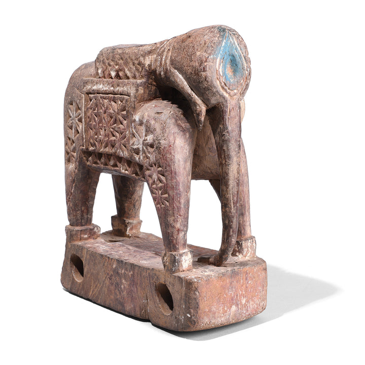 Angled View Of Hand Carved Wooden Indian Elephant Made From Teak With Geometric Pattern Detailing