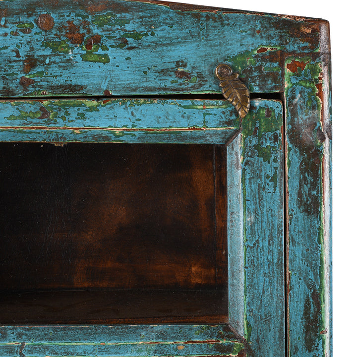 Corner Detail Of Brass Lock From Blue Painted Teak Glazed Wall Cabinet Circa 1930 With Distressed Patina