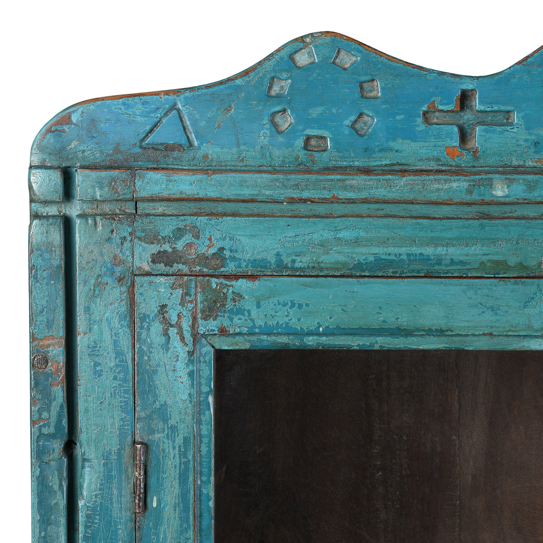 Decorative Crest Detail From Blue Painted Teak Glazed Wall Cabinet Circa 1930 With Double Doors And Decorative Crest