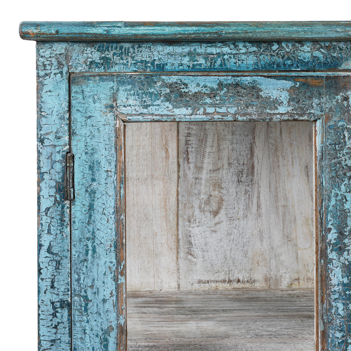 Corner Detail Showing Distressed Frame From Elegant Glazed Display Cabinet From 19th Century Gujarat With Distressed Blue Exterior And White Interior, Featuring Shelf For Generous Storage