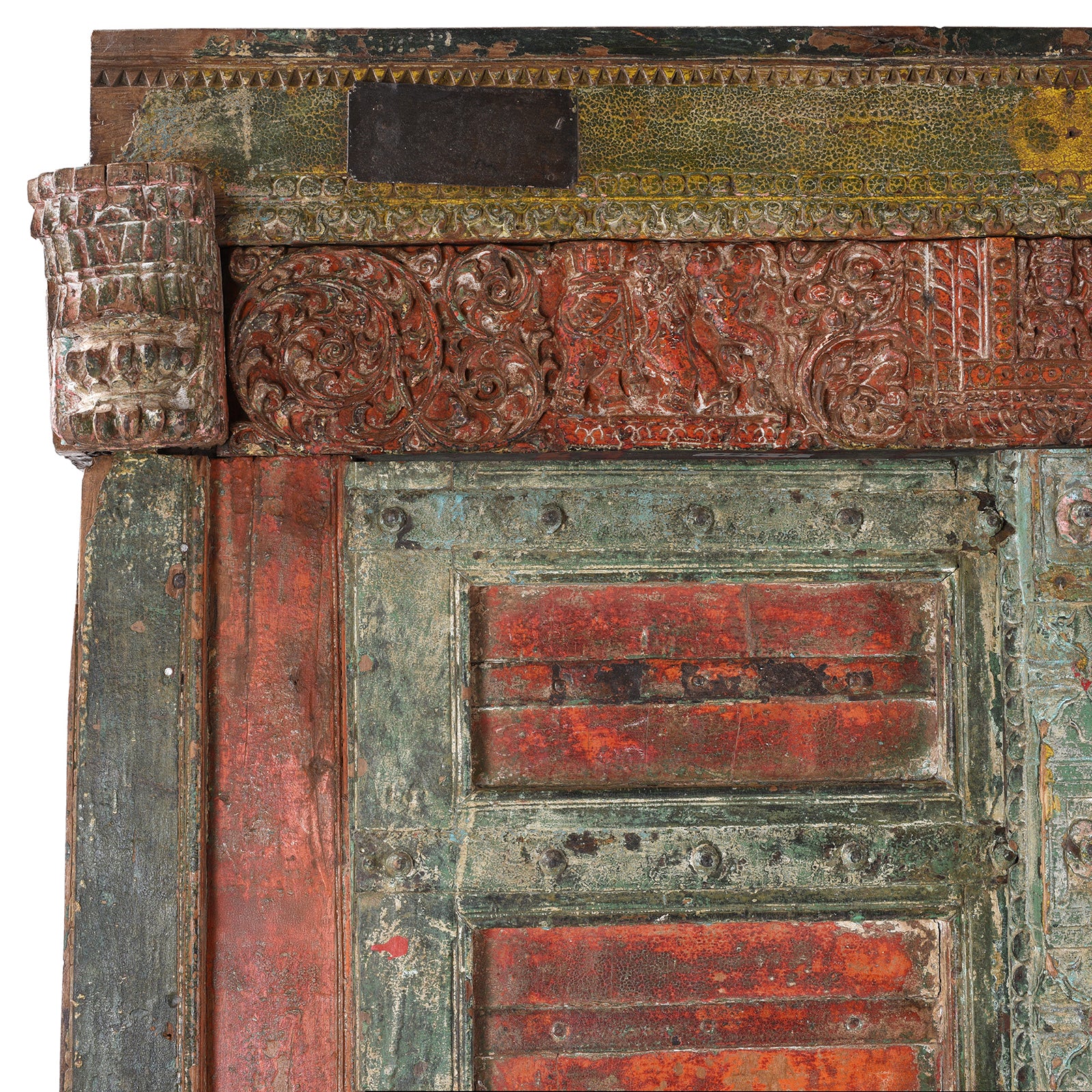 Top Corner Detail Showing Carvings On Painted Teak Indian Door With Carved Floral Frieze And Corbels From Kheba Gujarat