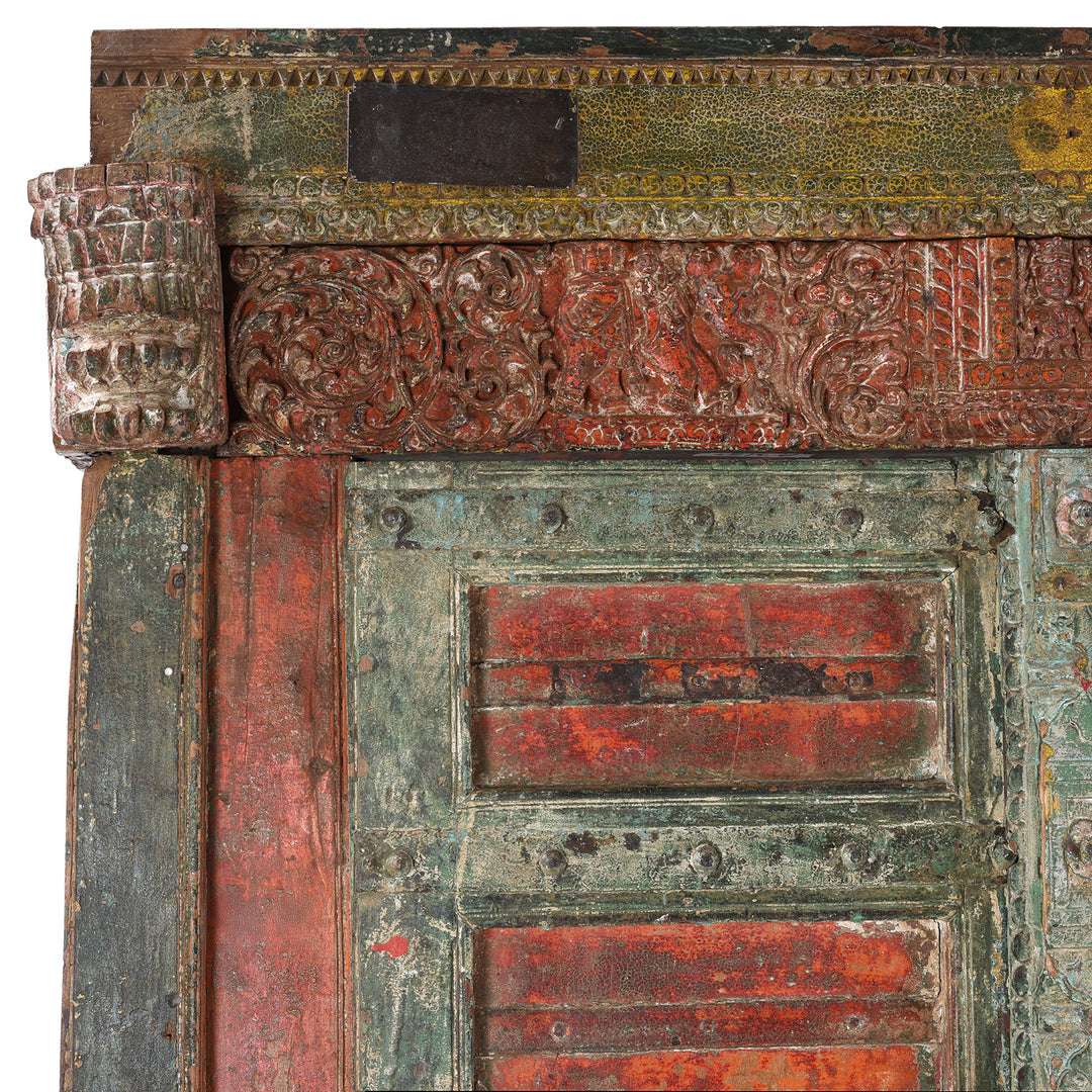Top Corner Detail Showing Carvings On Painted Teak Indian Door With Carved Floral Frieze And Corbels From Kheba Gujarat