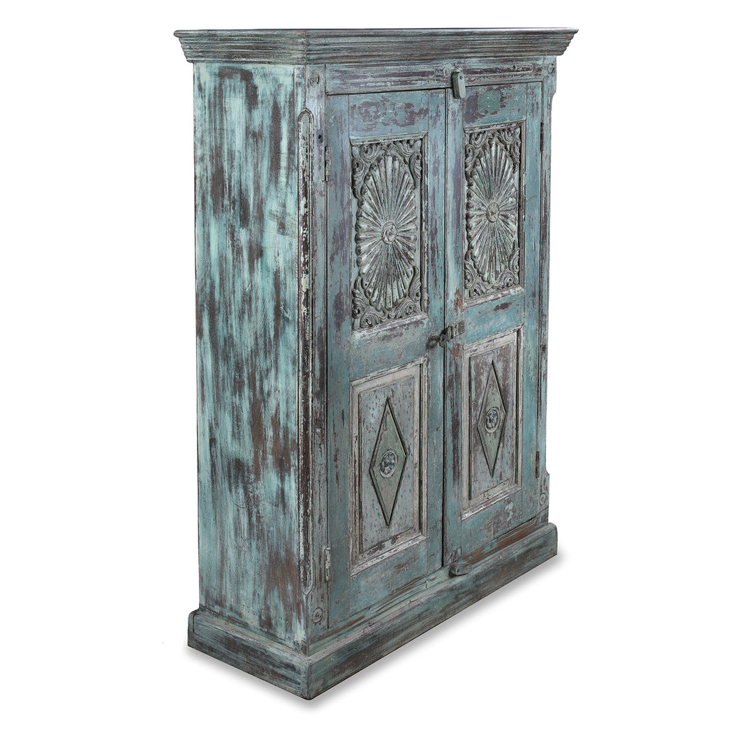Angled VIew Of 19th Century Painted Teak Almirah Cabinet With Portuguese Influenced Sunburst Carved Panels From Gujarat India | Indigo Antiques