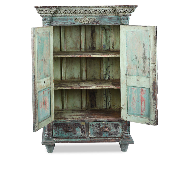 Interior Of Green Painted Sunburst Almirah Cabinet With Carved Teak Panels And Distressed Lime Washed Finish