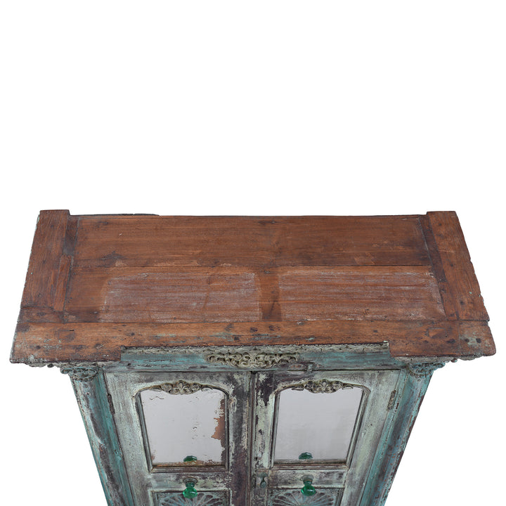 Top Down VIew Of Green Painted Sunburst Almirah Cabinet With Carved Teak Panels And Distressed Lime Washed Finish