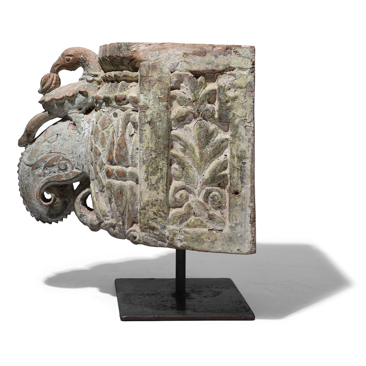 Side View Of Carved Teak Gujarati Elephant Corbel With Parrot And Floral Motifs On Stand