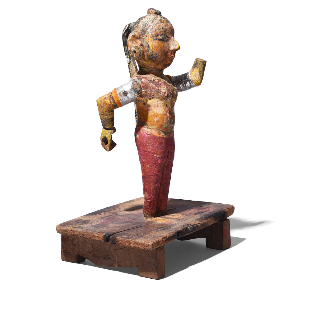 Angled View Of Carved Teak Gangaur Figure With Traditional Dress Makeup And Long Tied Back Hair From Jodhpur 19Th Century