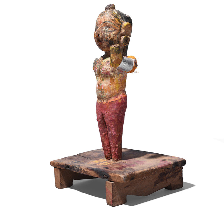 Side View Of Carved Teak Gangaur Figure With Traditional Dress Makeup And Long Tied Back Hair From Jodhpur 19Th Century