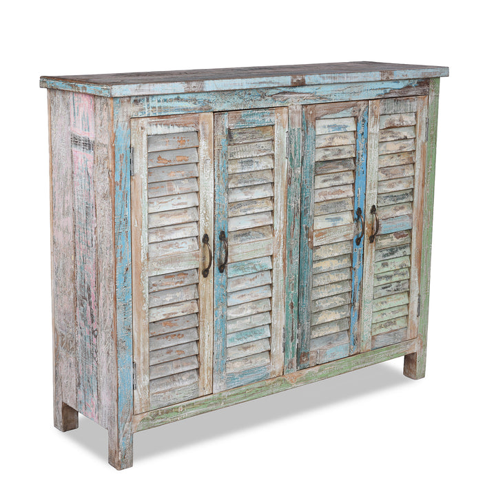 Angled View Of Painted Reclaimed Teak Four Door Louvre Sideboard With Distressed Multi Coloured Finish