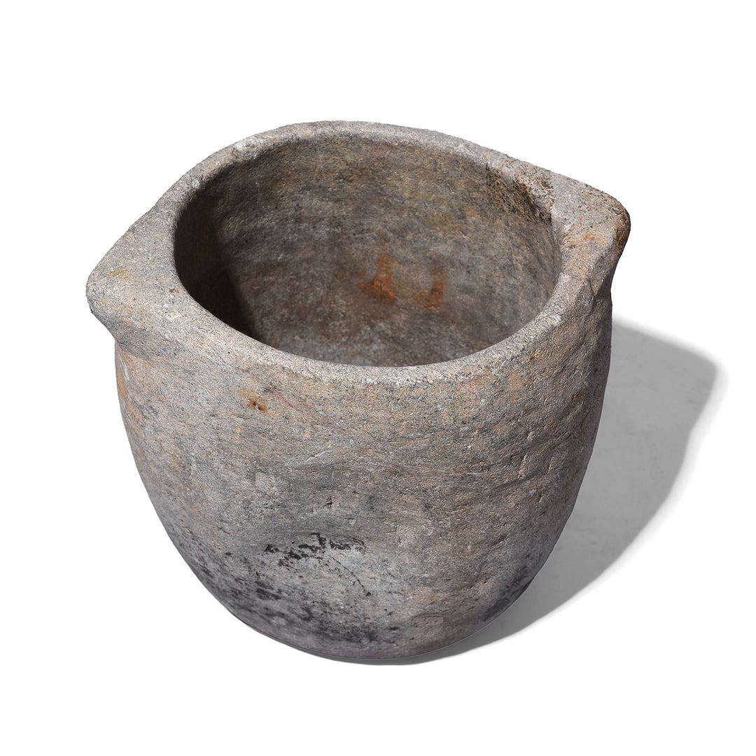 Interior Of Carved Stone South Indian Pot With Flared Rim And Weathered Surface