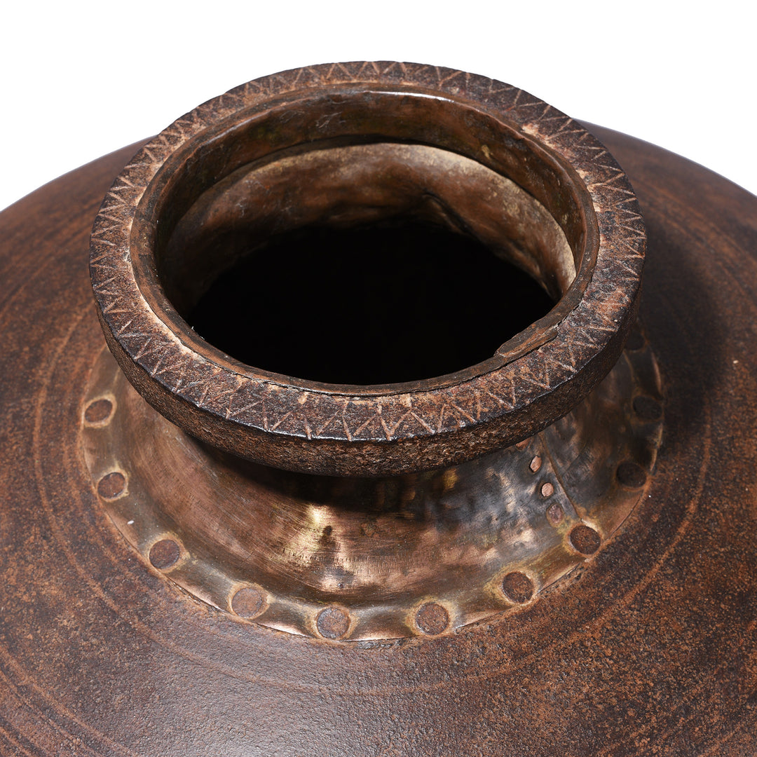 Rim Detail From iron lota originates from the Punjab region and dates to around the 1960s.