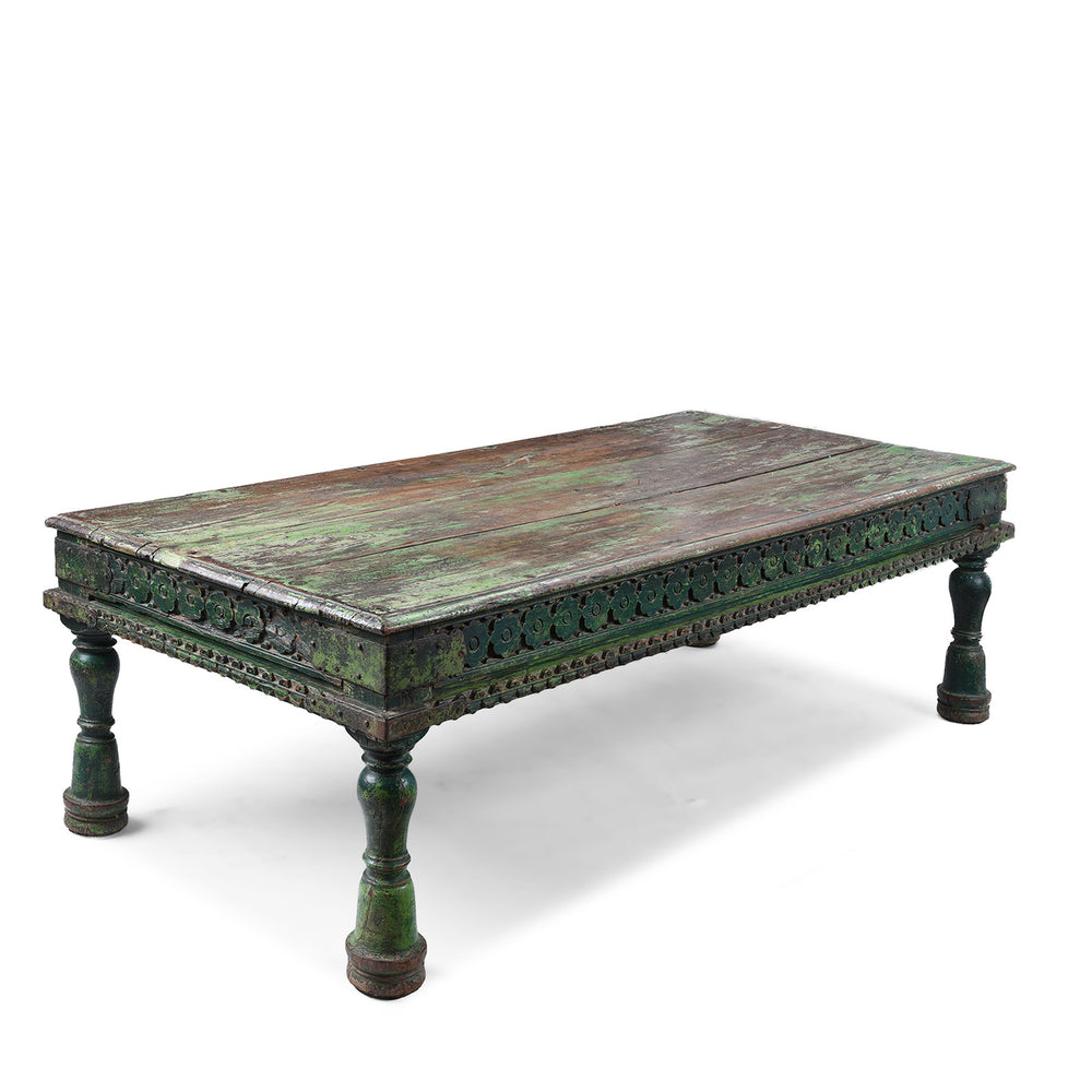 Angled View Of Green Painted Patan Takhat Coffee Table With Carved Sides