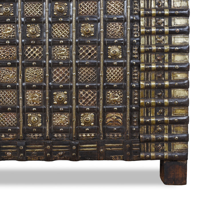 Leg Detail From Antique 18th Century Iron Bound Teak Pithara Dowry Chest With Brass Studs Carved Animal Motifs And Interior Chains Adapted As Console Table