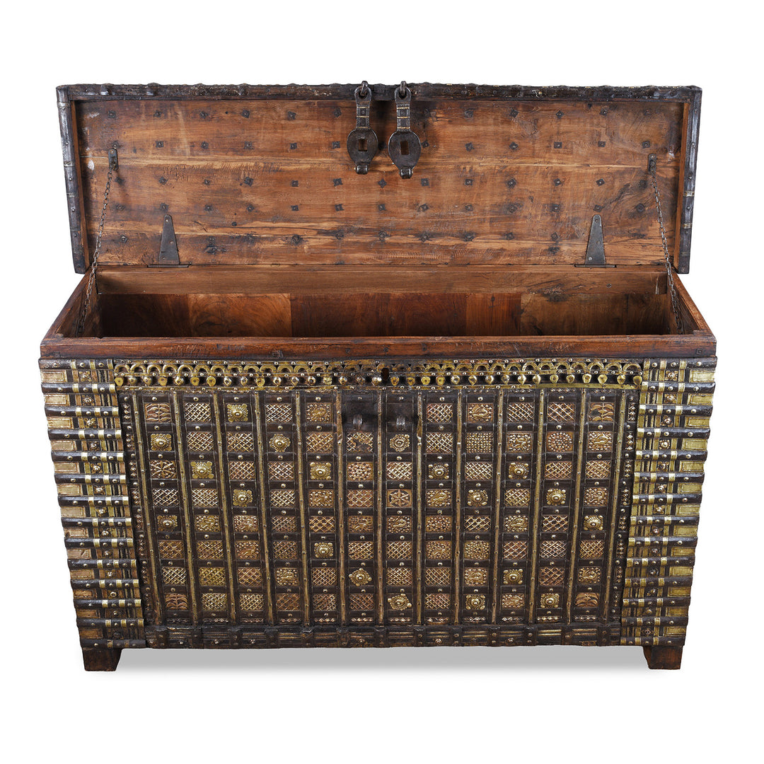Lid Open View Of Antique 18th Century Iron Bound Teak Pithara Dowry Chest With Brass Studs Carved Animal Motifs And Interior Chains Adapted As Console Table