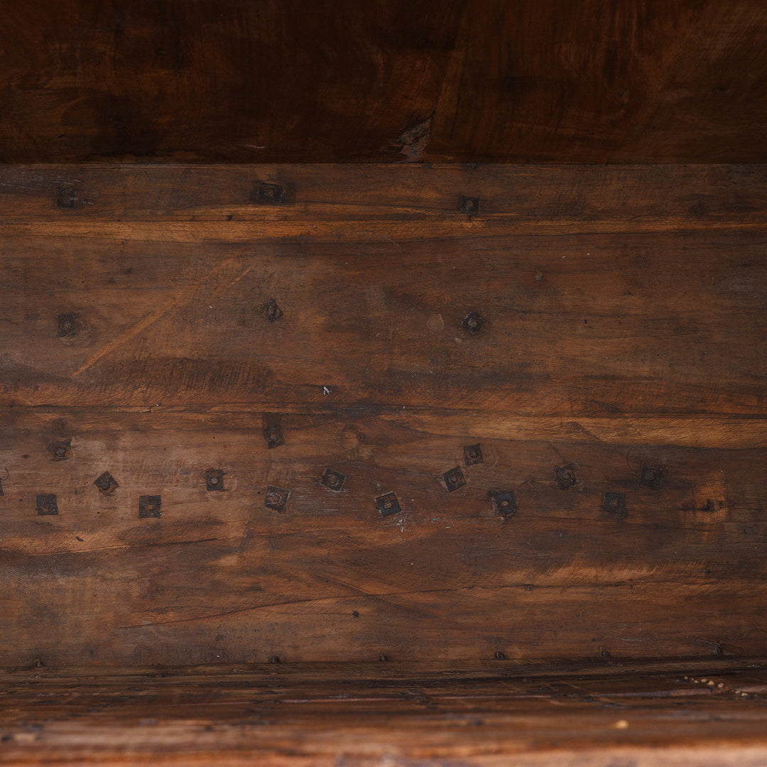 Interior Of Antique 18th Century Iron Bound Teak Pithara Dowry Chest With Brass Studs Carved Animal Motifs And Interior Chains Adapted As Console Table