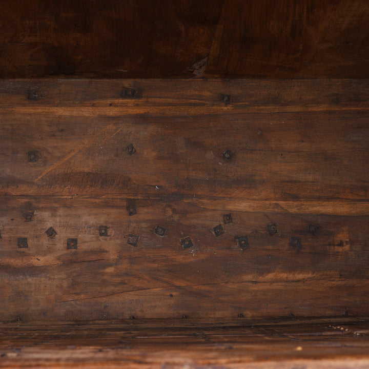 Interior Of Antique 18th Century Iron Bound Teak Pithara Dowry Chest With Brass Studs Carved Animal Motifs And Interior Chains Adapted As Console Table