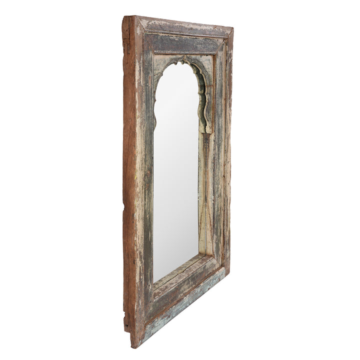 Angled View Of Antique Teak Haveli Window Frame Mirror With Distressed Paint And Mughal Arch Design