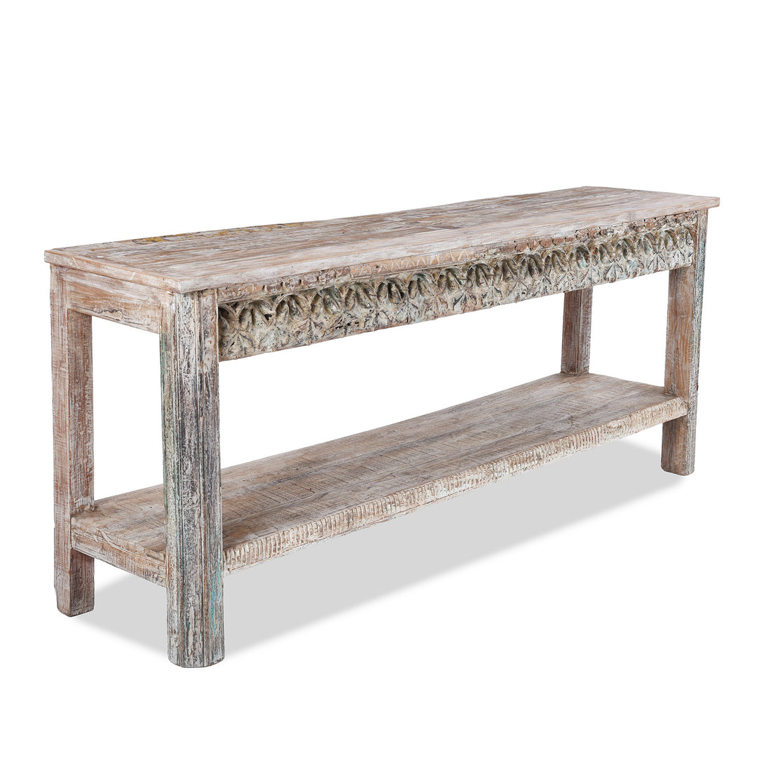 Angled View Of Carved Indian Console Table Made From Reclaimed Teak Wood With Floral Detailing