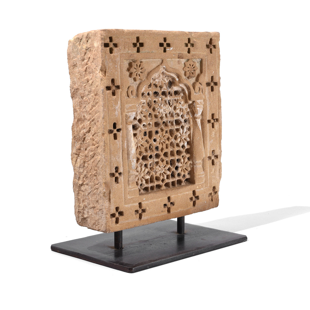 Angled View Of Carved Sandstone Jali Panel From Jaisalmer Rajasthan With Geometric And Floral Latticework Mounted On Iron Stand