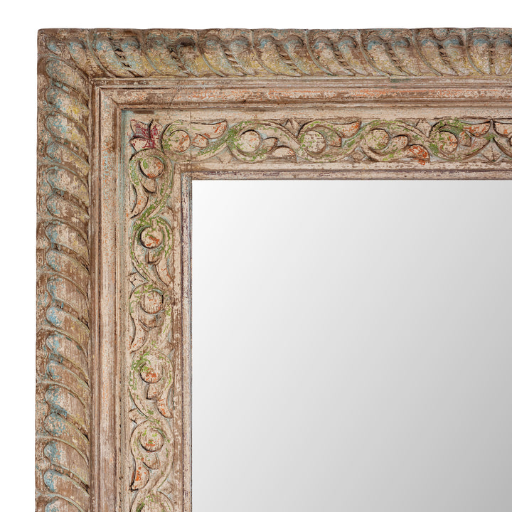 Corner Detail Showing Carvings On Hand Carved Indian Mango Wood Mirror With Floral Carving And Painted Detailing