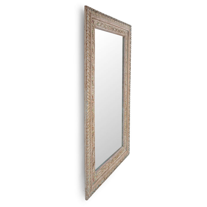 Angled VIew Of Hand Carved Indian Mango Wood Mirror With Floral Carving And Painted Detailing