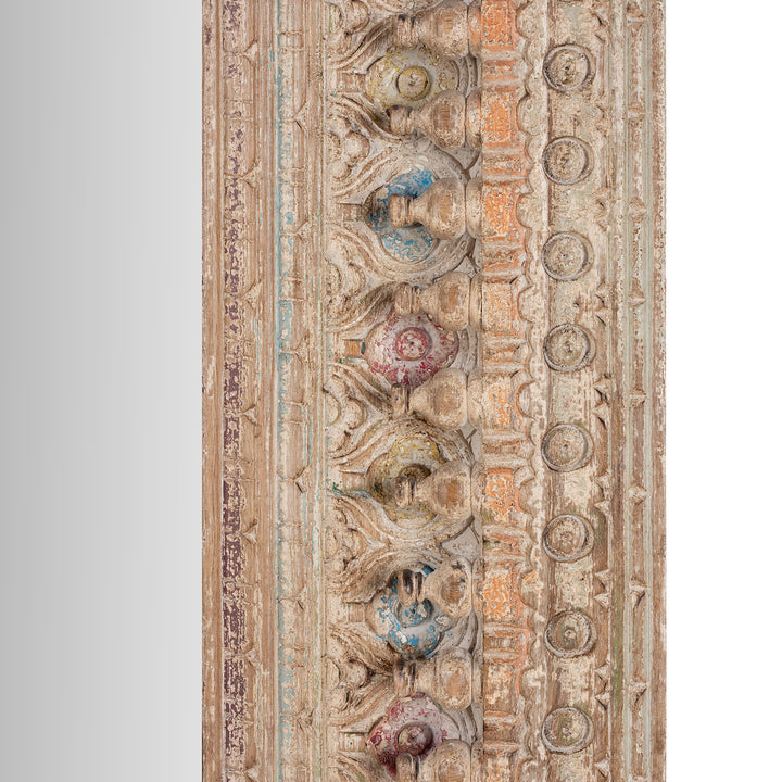 Carving Detail From Frame Of Indian Rectangular Hand Carved Mango Wood Mirror With Painted Floral And Geometric Detailing