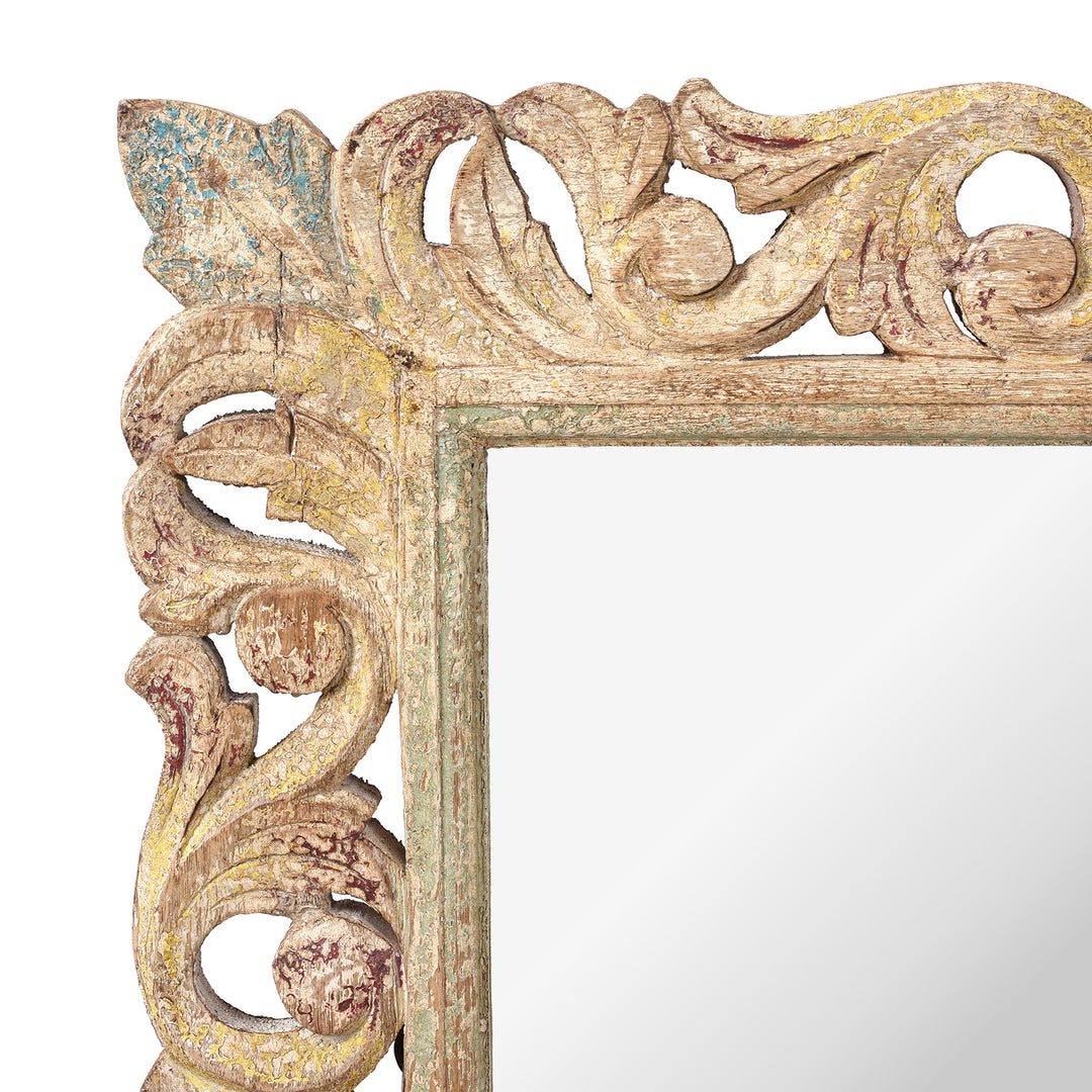 Corner Detail Showing Carving And Paintwork From Carved Mango Wood Indian Mirror With Yellow And Blue Painted Frame