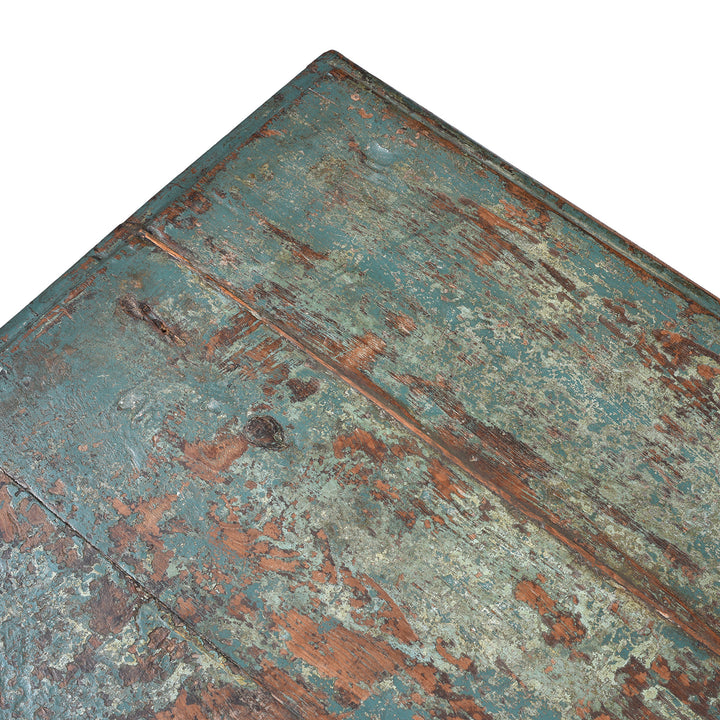 Detail Of Paintwork From Indian Antique Painted Teak Chest With Distressed Turquoise And Rust Patina And Iron Strap Detailing