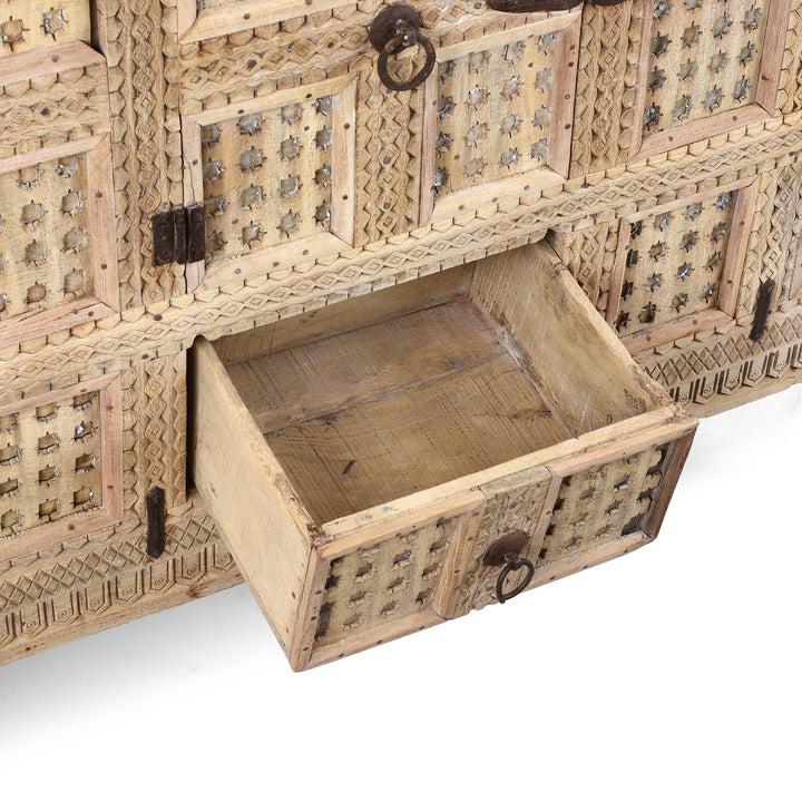 Open Drawer View Of Bleached Teak Indian Damchiya Chest With Intricate Hand-Carved Geometric Patterns And Hidden Tribal Compartments